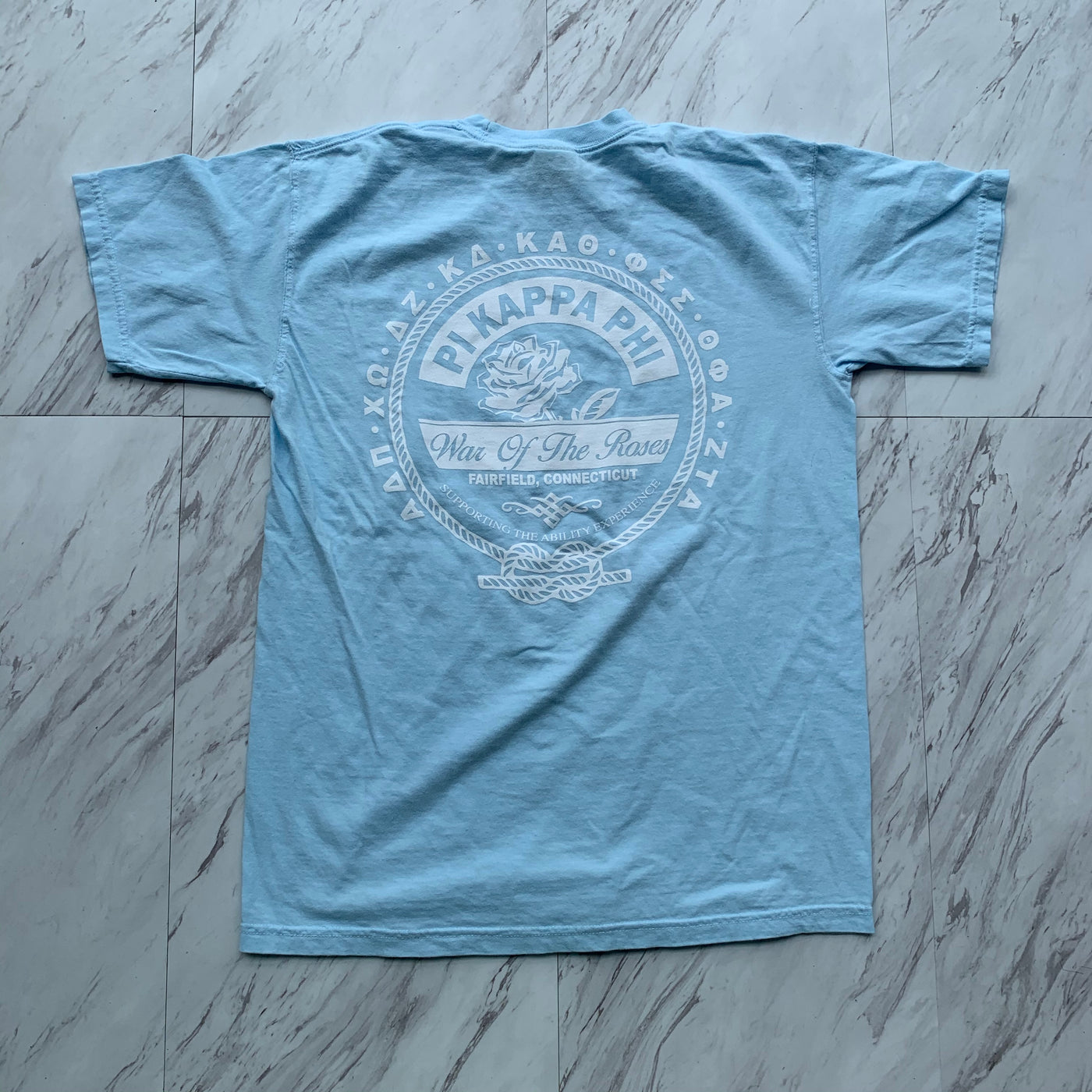 Pi Kappa Phi War of the Roses light blue tee