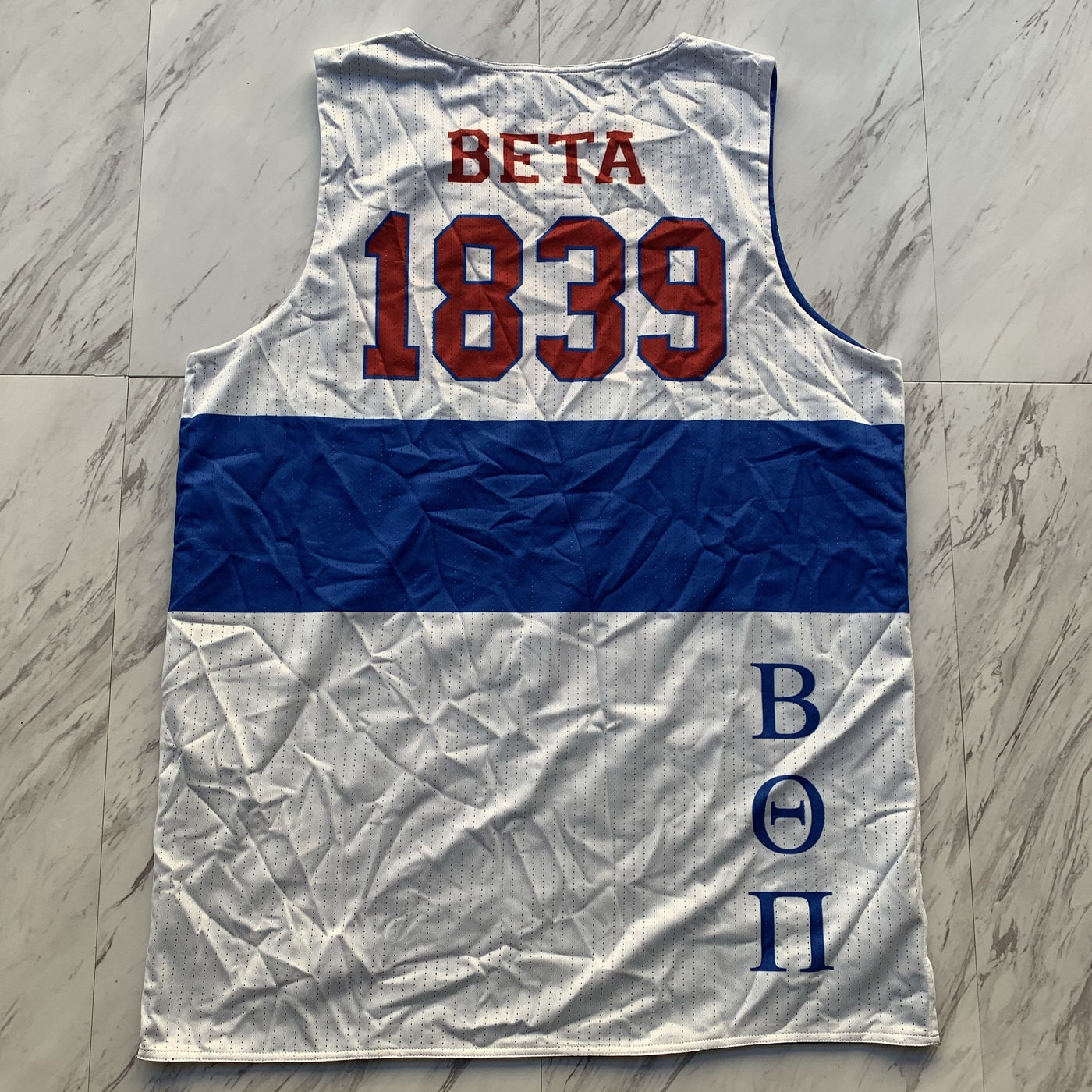 Beta Theta Pi white/blue reversible basketball jersey